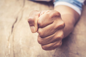 Clenched fist showing anger